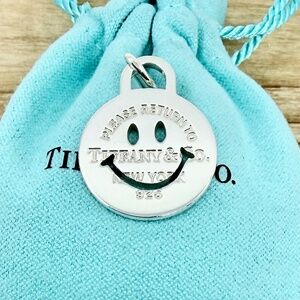 INCREDIBLY RARE  Tiffany & Co Smile Charm Pendant in Silver